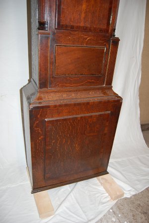 Grandfather clock had missing feet